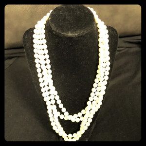 Long strain faux pearl necklace